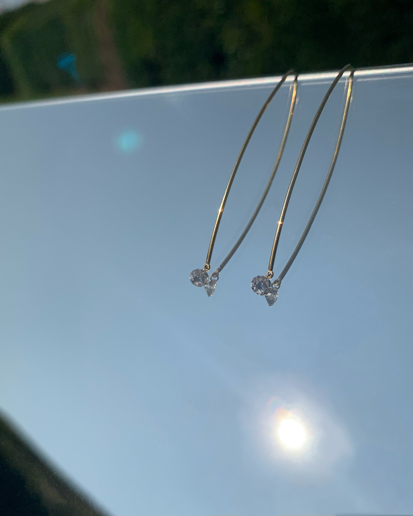 Boucle d'oreille chaîne 1 diamant