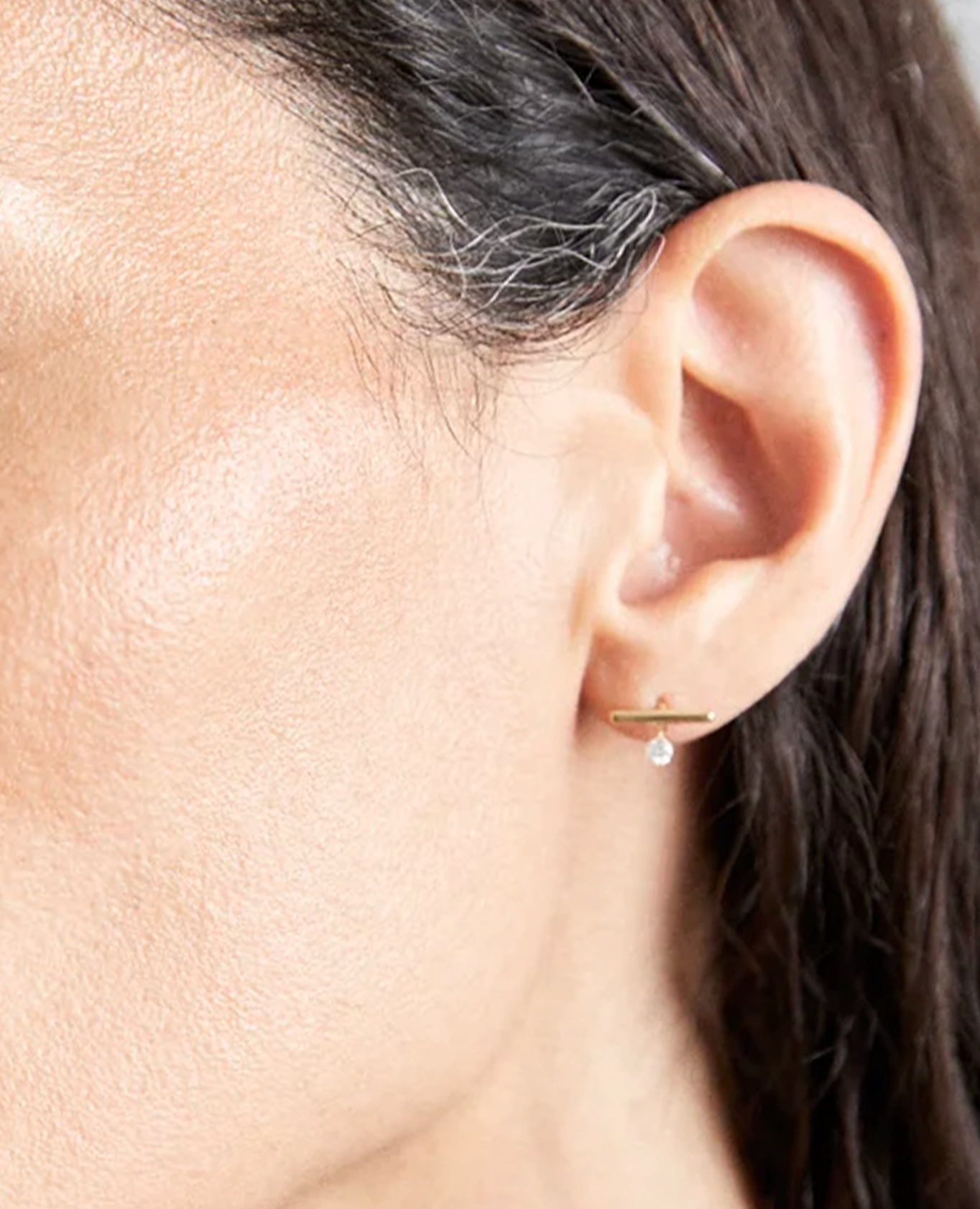 Mini bar piercing with a diamond