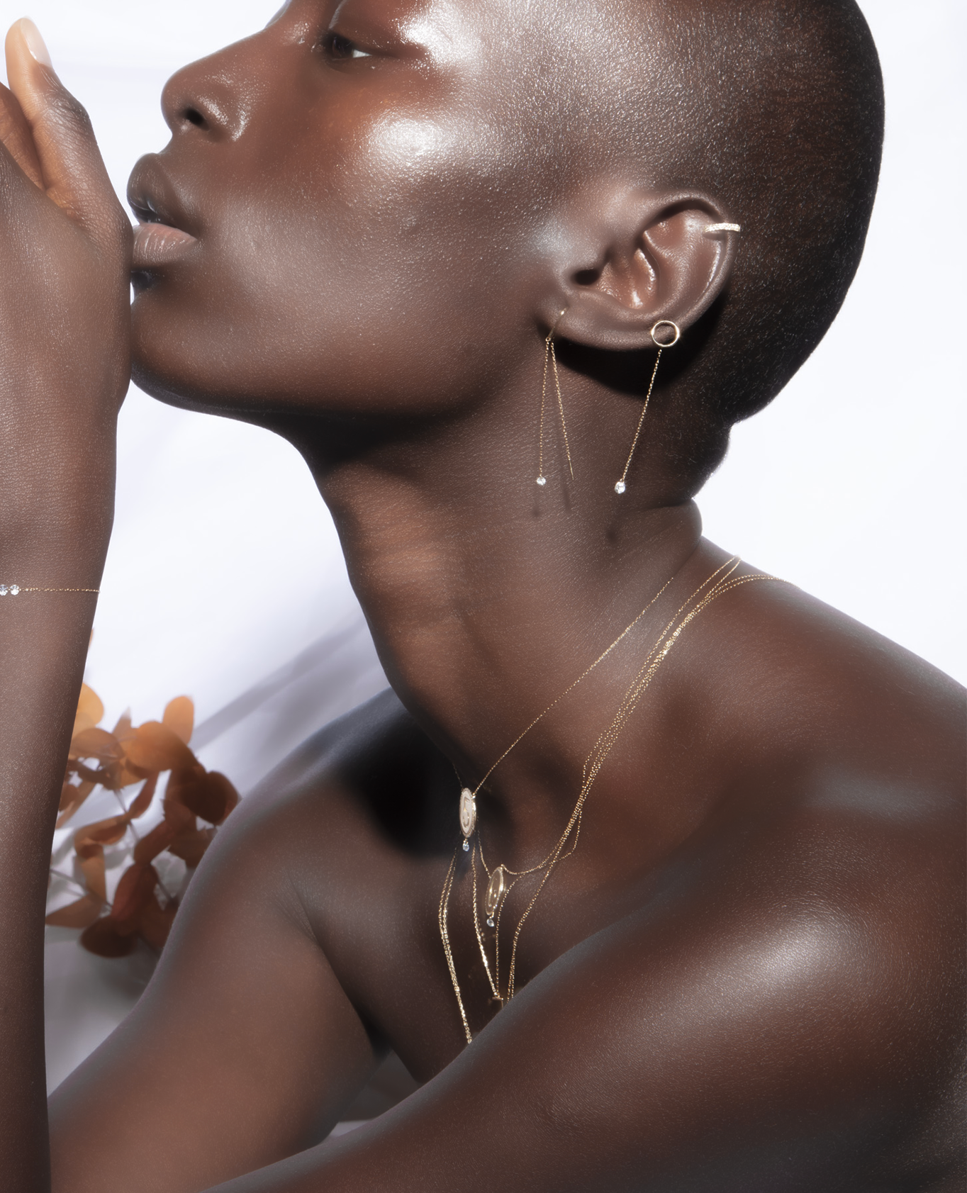 Boucle d'oreille Hélios chaîne un diamant